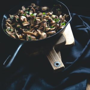 black frying pan with food on top